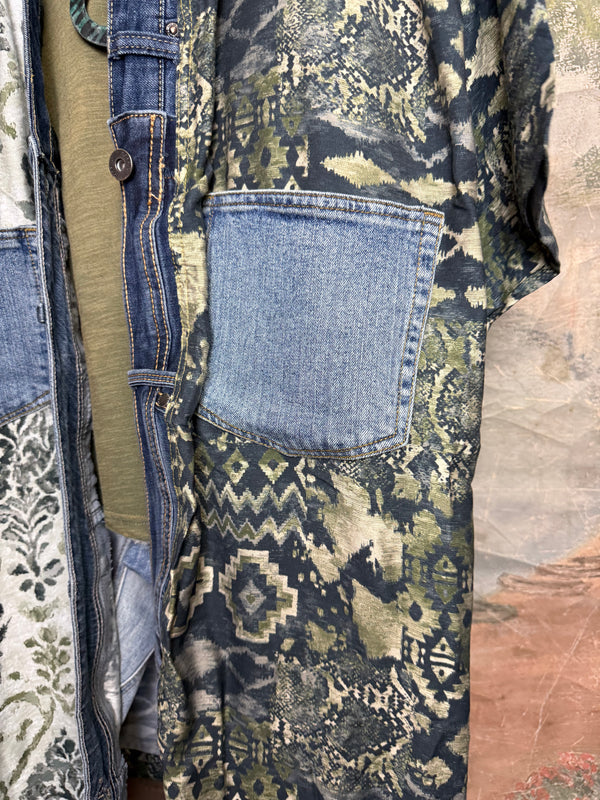 Boho patchwork denim cardigan with floral and aztec prints, large patch pockets, open front, styled with green necklace - 12