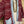 Load image into Gallery viewer, Burgundy bandana print short kimono with denim pocket accents, layered over white top and blue denim skirt with bead nec - 7
