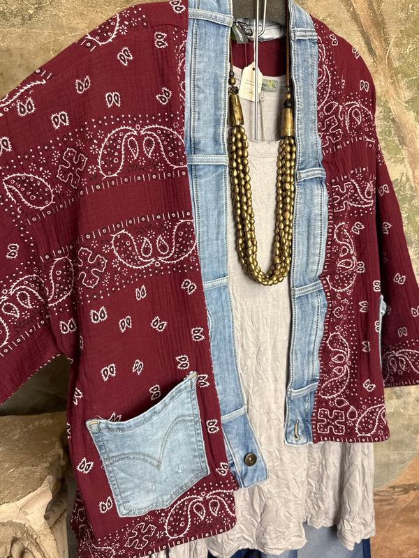 Burgundy bandana print short kimono with denim pocket accents, layered over white top and blue denim skirt with bead nec - 7