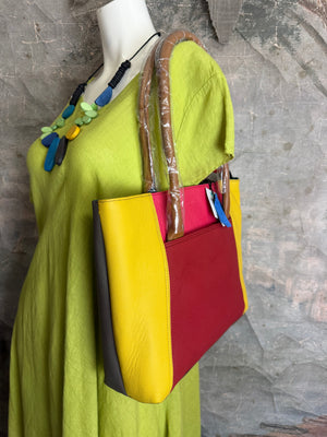 Folio colorblock leather tote bag in yellow, hot pink, and red with tan handles, boutique shoulder bag - 21