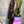 Load image into Gallery viewer, Sequin R&amp;L patch bomber jacket in purple and yellow-green ombre with floral accents, styled with tiered maxi skirt - 16
