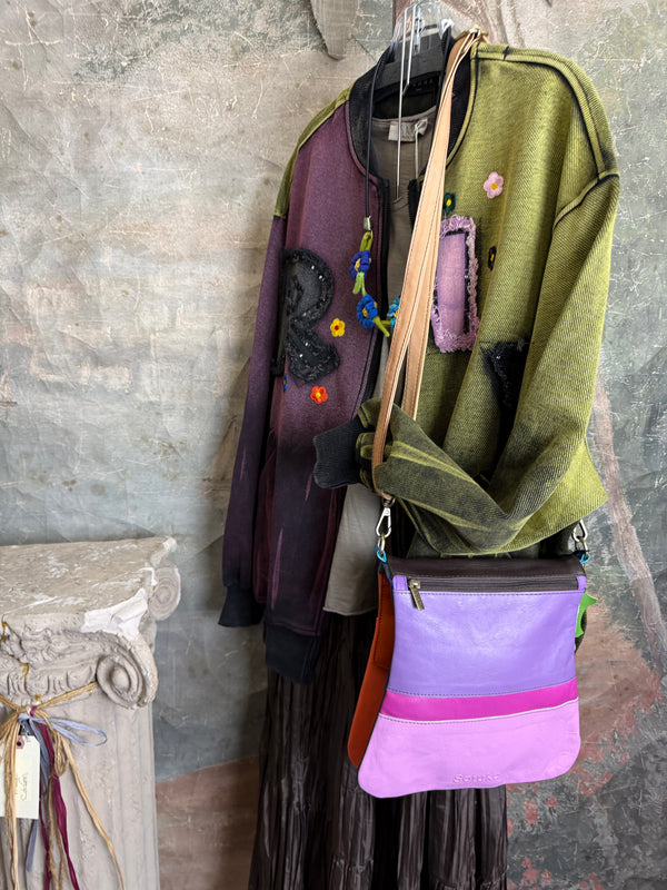 Sequin R&L patch bomber jacket in purple and yellow-green ombre with floral accents, styled with tiered maxi skirt - 16