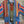 Load image into Gallery viewer, Boho serape striped duster cardigan with denim pockets, styled with red bead necklace and belt on mannequin - 8
