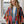 Load image into Gallery viewer, Woman wearing Stella Cardigan 5860 with rainbow serape stripes, denim trim, ruffle hem, and bell sleeves over white tee - 1
