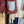 Load image into Gallery viewer, Burgundy bandana print short kimono with denim pocket accents, layered over white top and blue denim skirt with bead nec - 8
