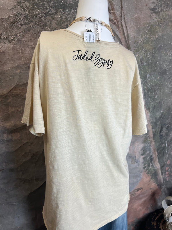 Beige t-shirt with 'Jaded Glory' text on a mannequin against a textured gray background