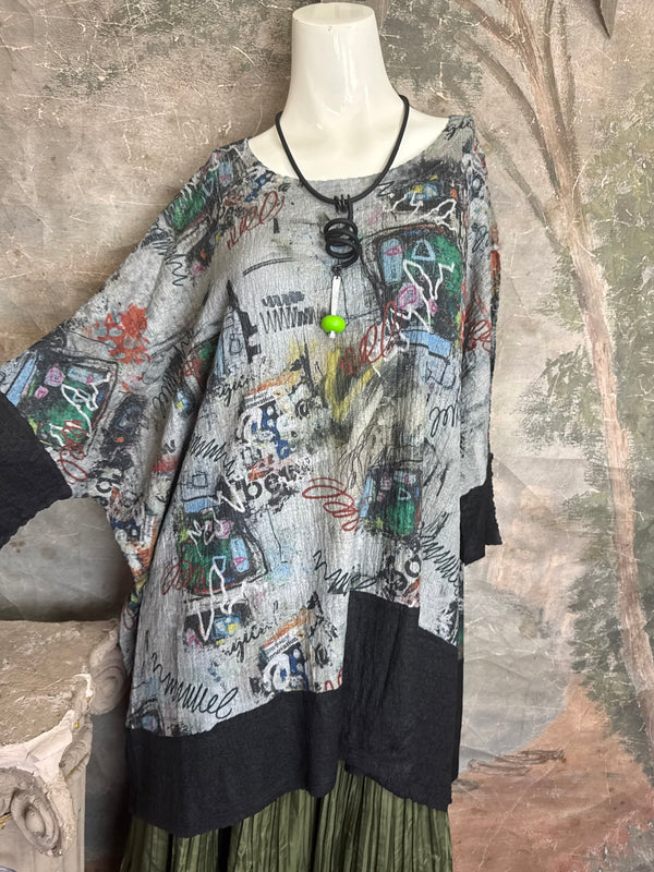 T1597 Waffle Knit Pullover with graffiti print over olive green crinkle tiered skirt on mannequin - 4