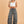 Load image into Gallery viewer, Woman wearing gray camouflage cargo jogger pants with patch pockets and white crop top, casual street style outfit - 1
