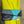 Load image into Gallery viewer, Mila color-block crossbody bag in teal, blue, and navy leather with turquoise strap, styled on mannequin with lime dress - 2
