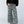 Load image into Gallery viewer, Woman wearing TBN6292 Wanderer Wide Leg Camo Pants with black top and layered necklaces, wide leg silhouette - 1
