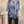 Load image into Gallery viewer, Oversized crew pullover in vibrant multicolor abstract print with flower necklace, paired with black pants on mannequin - 1
