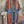 Load image into Gallery viewer, Boho serape striped duster cardigan with denim pockets, styled with red bead necklace and belt on mannequin - 1

