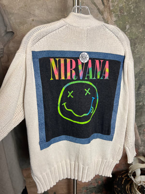 Women wearing cream knit Rockstar Cardigan Sweaters with Rolling Stones and Elton John patches, styled with jeans and bo - 15