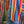 Load image into Gallery viewer, Boho serape striped duster cardigan with denim pockets, styled with red bead necklace and belt on mannequin - 13

