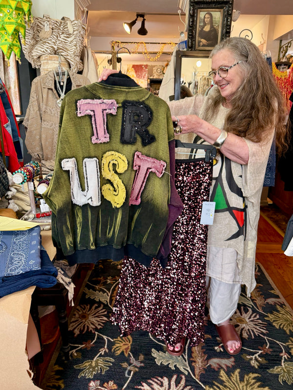 Sequin R&L patch bomber jacket in purple and yellow-green ombre with floral accents, styled with tiered maxi skirt - 7