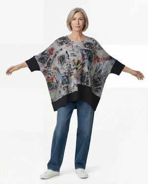 T1597 Waffle Knit Pullover with graffiti print over olive green crinkle tiered skirt on mannequin - 2