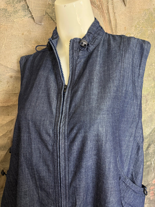 Long denim zip-front sleeveless vest with drawstring hem displayed on mannequin, boutique Merritt style - 6