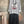 Load image into Gallery viewer, Gray heather Never Grow Up graphic sweatshirt top styled with black crinkle maxi skirt and beaded necklace - 2
