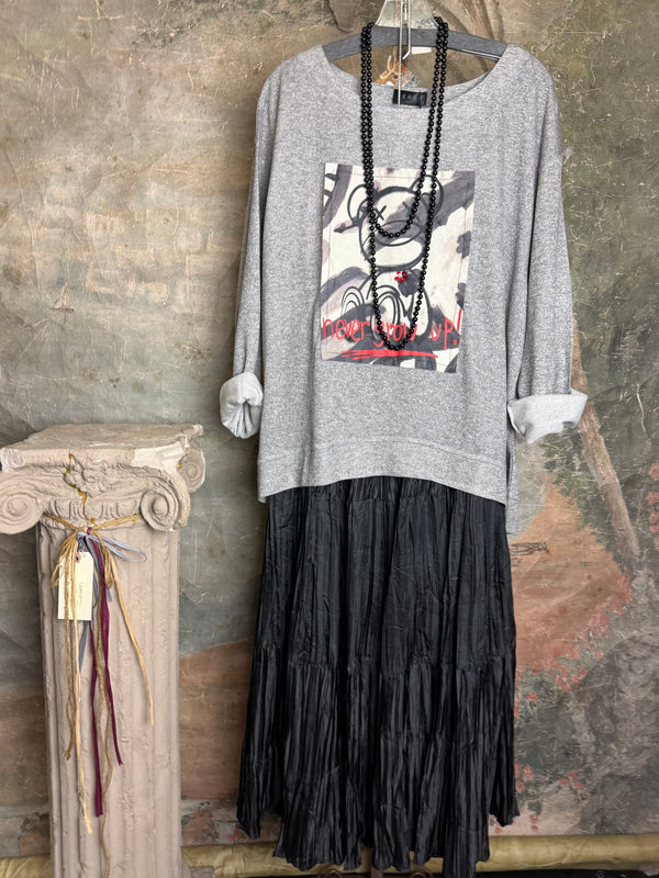 Gray heather Never Grow Up graphic sweatshirt top styled with black crinkle maxi skirt and beaded necklace - 2