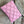 Load image into Gallery viewer, Pink leather quilted crossbody bag with geometric stitching pattern and black adjustable strap on lime green dress - 5

