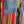 Load image into Gallery viewer, Boho serape striped duster cardigan with denim pockets, styled with red bead necklace and belt on mannequin - 15
