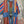 Load image into Gallery viewer, Boho serape striped duster cardigan with denim pockets, styled with red bead necklace and belt on mannequin - 3
