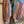 Load image into Gallery viewer, Boho serape striped duster cardigan with denim pockets, styled with red bead necklace and belt on mannequin - 10

