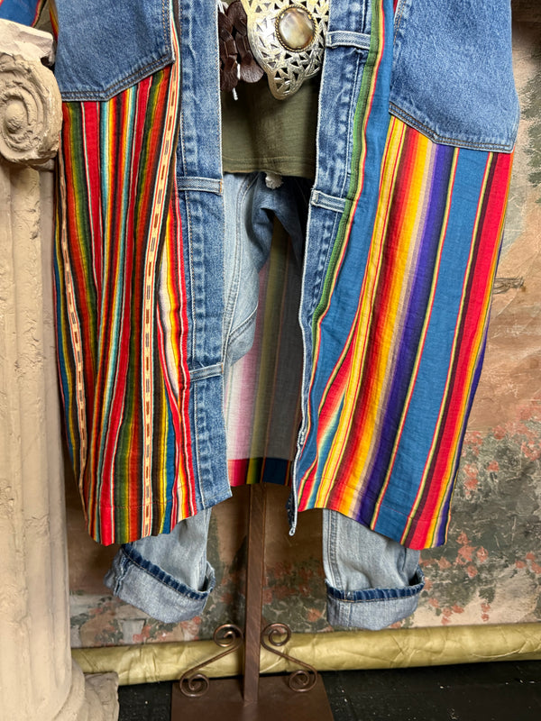 Boho serape striped duster cardigan with denim pockets, styled with red bead necklace and belt on mannequin - 10