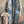 Load image into Gallery viewer, Boho patchwork denim cardigan with floral and aztec prints, large patch pockets, open front, styled with green necklace - 14

