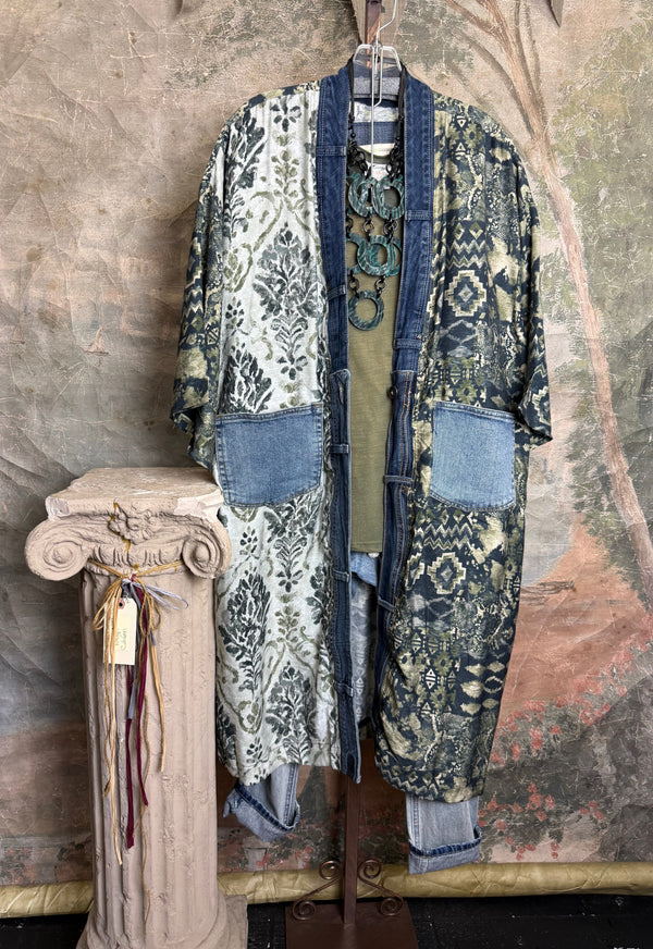 Boho patchwork denim cardigan with floral and aztec prints, large patch pockets, open front, styled with green necklace - 14