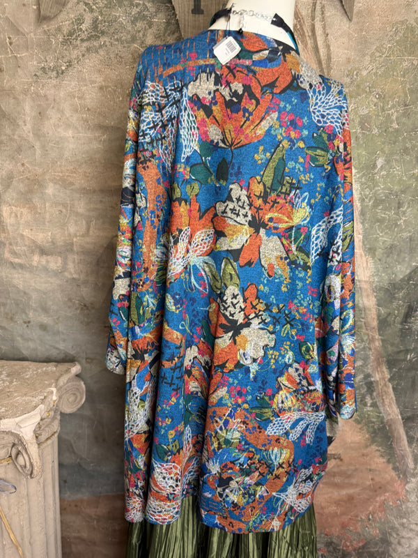 Oversized blue floral print crew pullover with orange and multicolor botanical pattern, long sleeves, relaxed fit - 1
