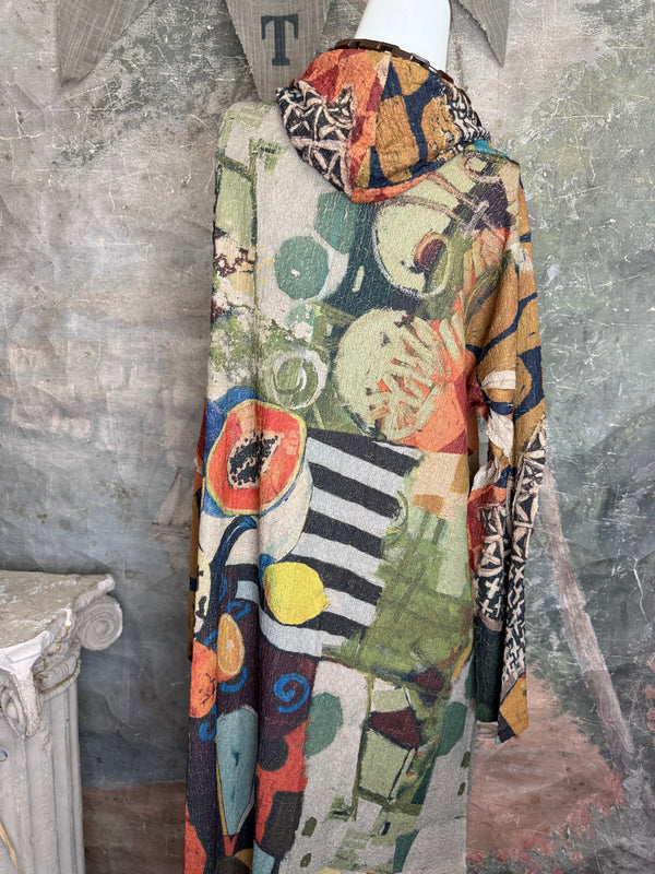 D541 waffle knit cowlneck dress featuring vibrant abstract fruit and geometric mixed print, draped on mannequin - 23