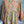 Load image into Gallery viewer, Woman wearing DYM90081 Bloomspell Maxi Dress in orange floral print with pink Converse sneakers in boutique setting - 11
