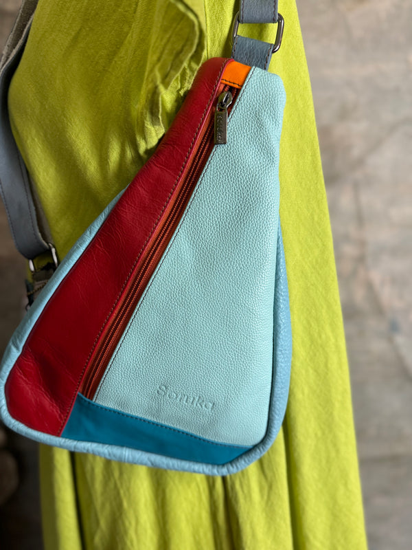 Soruka multicolor leather sling crossbody bag in light blue, red, and teal with orange zipper detail - 4