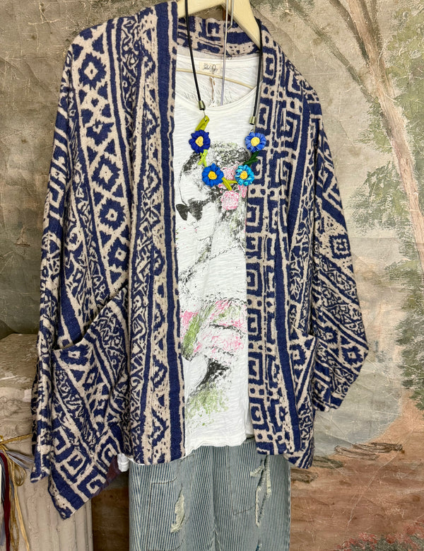Blue white shibori ikat print kimono jacket open front boho style layered over floral tee with flower necklace - 5