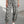 Load image into Gallery viewer, Woman wearing gray camouflage cargo jogger pants with patch pockets and white crop top, casual street style outfit - 6
