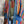 Load image into Gallery viewer, Boho serape striped duster cardigan with denim pockets, styled with red bead necklace and belt on mannequin - 14
