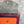 Load image into Gallery viewer, Goruka Grace Reversible Loop-B colorblock leather bag in blue, burgundy, orange with zebra print strap on stone column - 4
