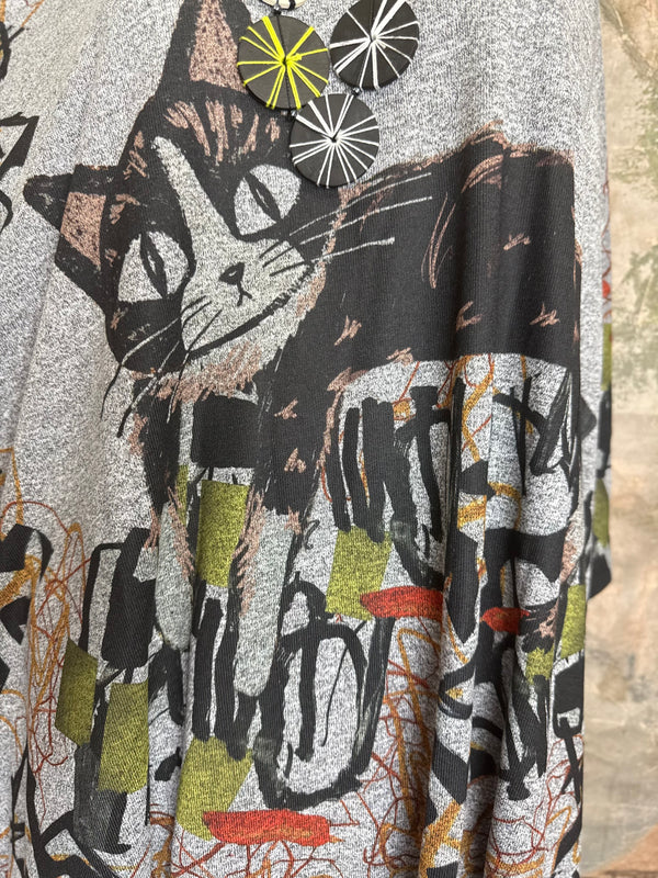 Oversized gray cat print crew pullover tunic with abstract art design on mannequin, styled with olive skirt and neon nec - 15