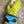 Load image into Gallery viewer, Mila color-block crossbody bag in teal, blue, and navy leather with turquoise strap, styled on mannequin with lime dress - 6
