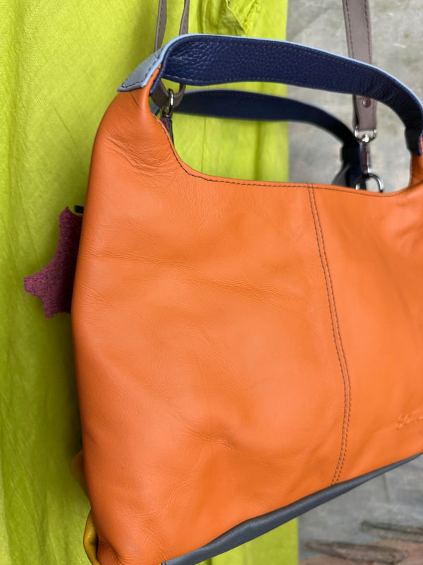 Soruka orange multicolor leather crossbody bag with gray strap on lime green linen dress mannequin - 14