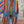Load image into Gallery viewer, Boho serape striped duster cardigan with denim pockets, styled with red bead necklace and belt on mannequin - 5
