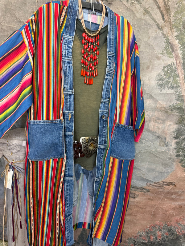 Boho serape striped duster cardigan with denim pockets, styled with red bead necklace and belt on mannequin - 5