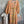 Load image into Gallery viewer, Woman wearing DYM90081 Bloomspell Maxi Dress in orange floral print with pink Converse sneakers in boutique setting - 2
