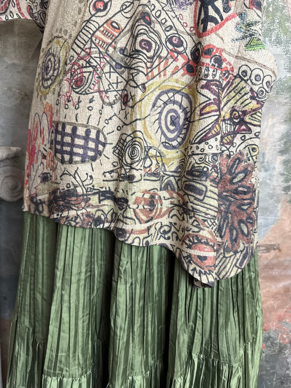 Boho waffle knit tunic top with abstract art print in earthy tones, styled with colorful chain necklace on mannequin - 5