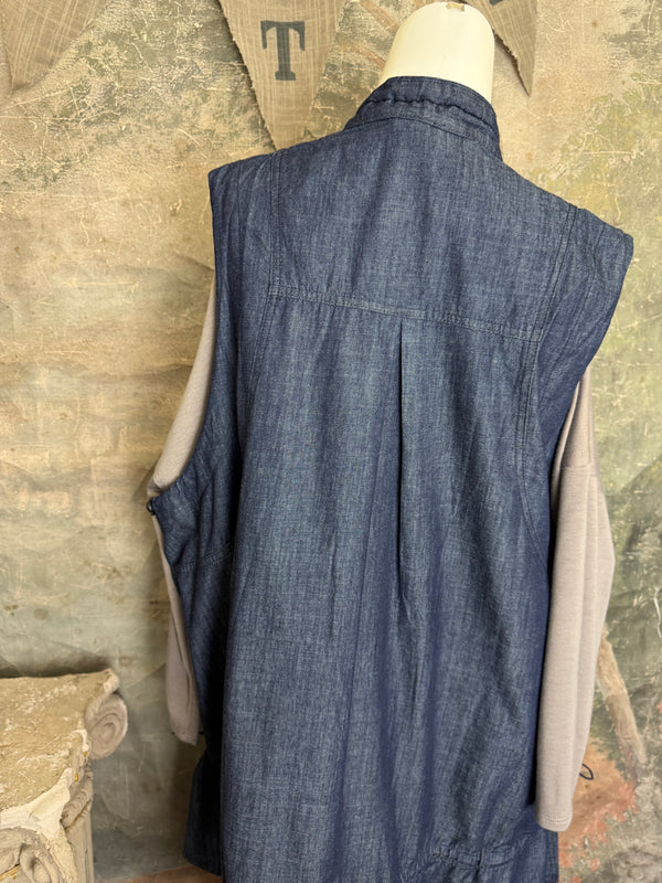 Long denim zip-front sleeveless vest with drawstring hem displayed on mannequin, boutique Merritt style - 11
