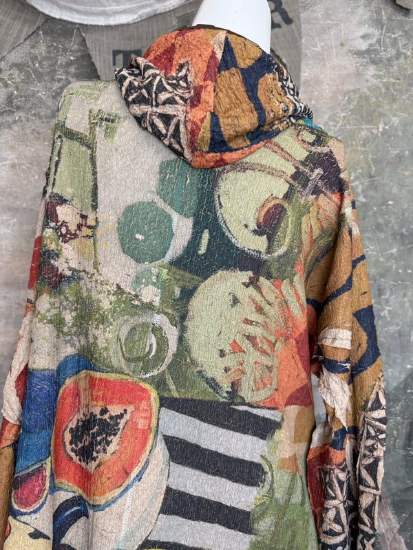 D541 waffle knit cowlneck dress featuring vibrant abstract fruit and geometric mixed print, draped on mannequin - 25