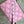 Load image into Gallery viewer, Pink leather quilted crossbody bag with geometric stitching pattern and black adjustable strap on lime green dress - 3

