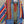 Load image into Gallery viewer, Boho serape striped duster cardigan with denim pockets, styled with red bead necklace and belt on mannequin - 6
