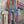 Load image into Gallery viewer, Boho serape striped duster cardigan with denim pockets, styled with red bead necklace and belt on mannequin - 16
